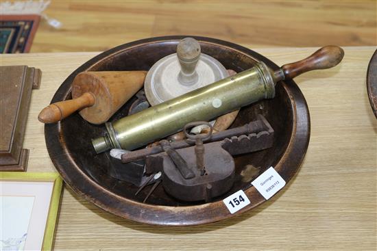 A turned sycamore bowl, 40cm, sundry treen and an iron block